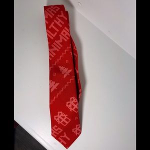 Dec. 25th “Merry Christmas You Filthy Animal,” neck tie.